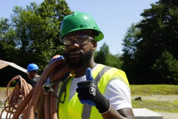 Worker giving thumbs up